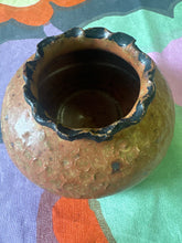 Cute vintage textured ceramic vessel